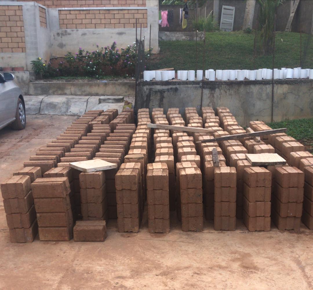 On-site interlocking brick production and construction