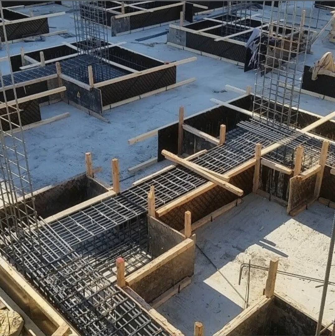 Rebar and formwork laid out with precision ahead of a concrete pour
